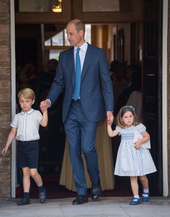 Książę Jerzy, książę William i księżniczka Charlotte na chrzcinach księcia Louisa, 9.07.2018.