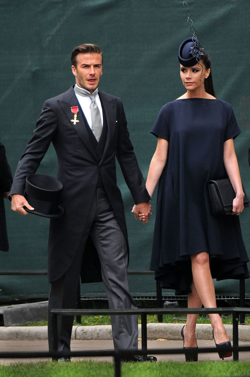 David i Victoria Beckham przybywają na królewski ślub księcia Williama i Catherine Middleton w Opactwie Westminsterskim 29 kwietnia 2011 r. w Londynie.